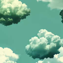 a group of clouds that are flying in the air