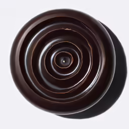 top view of circular brown surface with white background