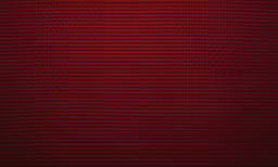 dark red, textured material is the background