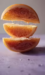 the sliced grapefruit has been placed on a table