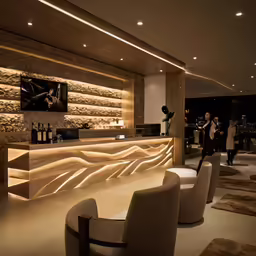 a very elegant hotel lobby with modern decor