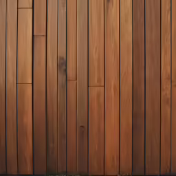 an exterior wooden structure with a cat statue on the wall