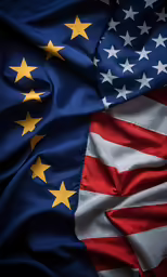 a close up of an american and european flag