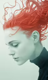 a young man with hair in the middle of his head