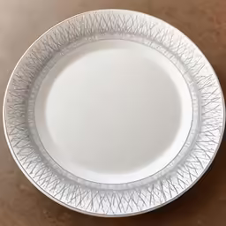 this is an image of white plastic plate