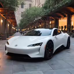 a futuristic car parked on a city street