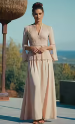 a woman is posing in a dress and sandals