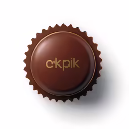 an empty brown bottle cap with the words dk p k