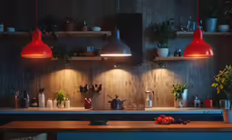 a kitchen counter topped with two lamps