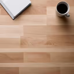 a table with coffee, books and a notebook