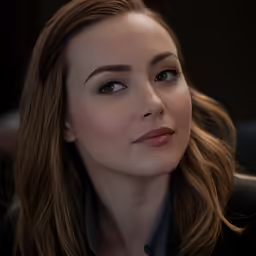 a woman with a black jacket and a dark shirt