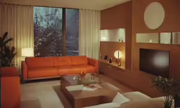 a living room with lots of furniture and a big window