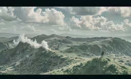 two people stand on top of a high mountain