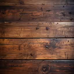 an old, dark wooden background with only wood grain