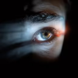 an image of a person looking at a camera through the lens