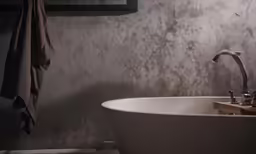 the wallpaper is a pale grey color, with white and black details
