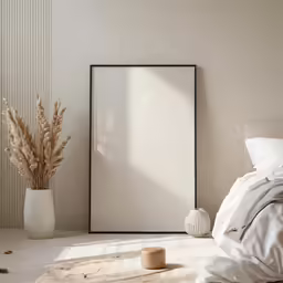 a room with a bed, white curtains and brown pillows