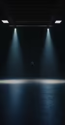 a person in the middle of a dark space