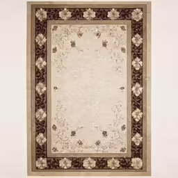 the area rug in front of the wall is beige