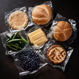 bread, green beans, beans, cheese and other foods on wax paper