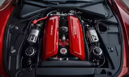 the engine is located in the red car