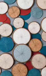 many wooden disks arranged in a mosaic pattern