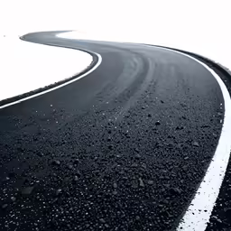 two black and white wavy lines on a road