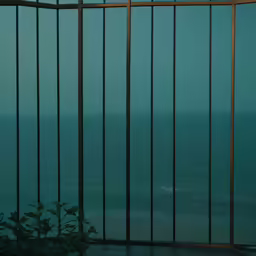 there is a bench sitting near the railings