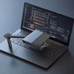 there is a portable laptop computer hooked to a mouse