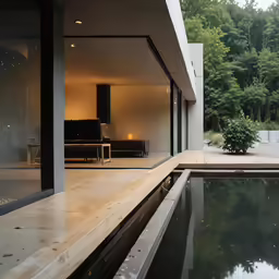an outdoor swimming pool in the middle of a home