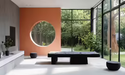 a room that has orange walls with a mirror