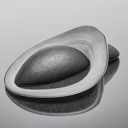 two metal spoons on a table in the water