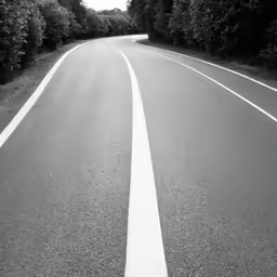 an image of the road from the top of a hill