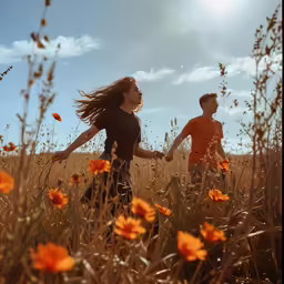 two people walking in a field of flowers