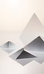 four white pyramids floating in the air