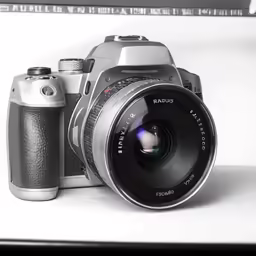 black and white photo of the silver canon