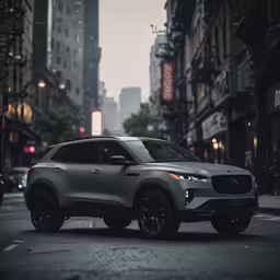 a silver car is driving down the road