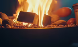 an image of a fire that is cooking in the grill