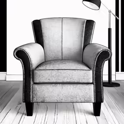 a chair on a wooden floor near a lamp