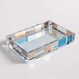 a mirrored tray with colored sections on it