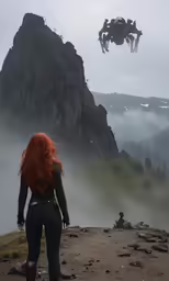 there is a woman looking out at the mountains