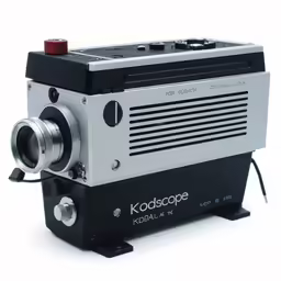 a camera sitting on top of a wooden base