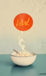 a bowl full of food with a stick in the top