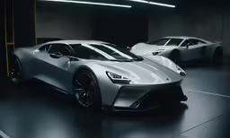 a silver sports car sitting in a garage