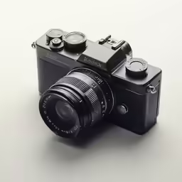 an old black camera with three cameras