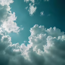 a group of clouds floating in the sky