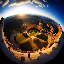 a 360 lens photograph looking down at a landscape