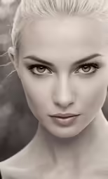 a black and white photograph of a blond woman