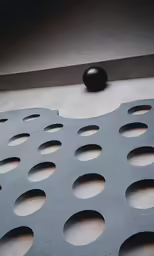 there is a black object on the floor near it