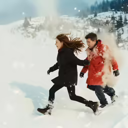 a couple runs through the snow on a bright winter day